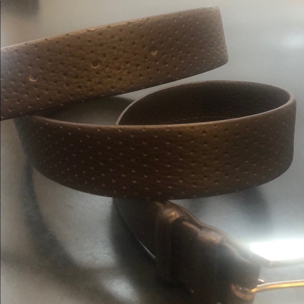 Chocolate brown belt: no sign of wear. Clean nice